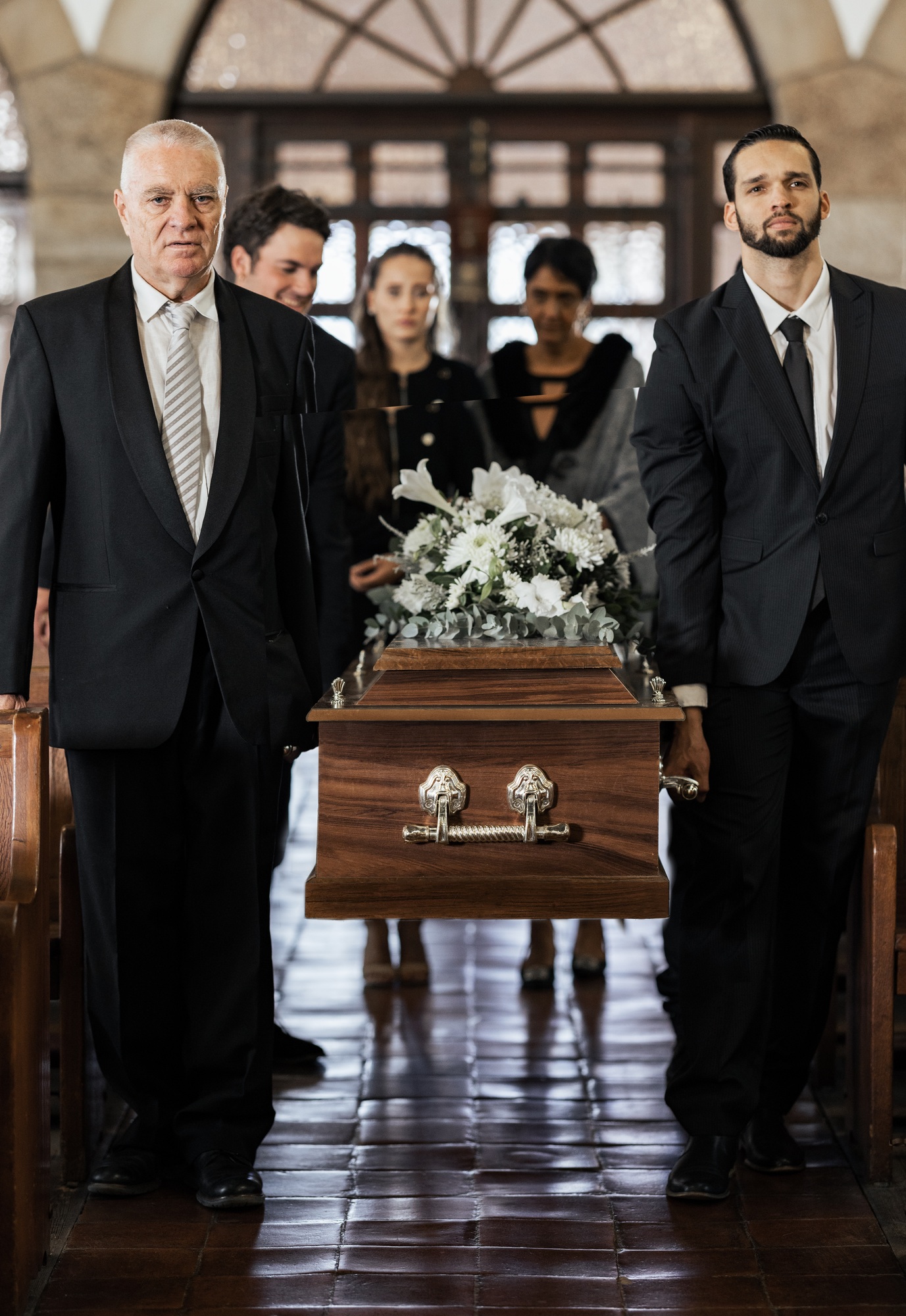 Funeral, church and family carry coffin for death, grief or sermon for burial with support. People,